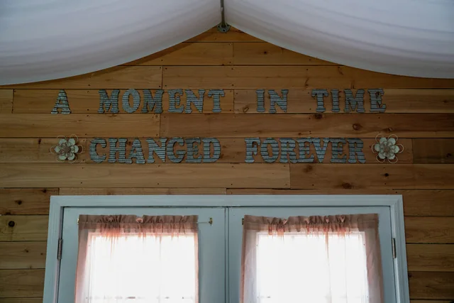 Wedding decorations displayed above the wooden barn doors
