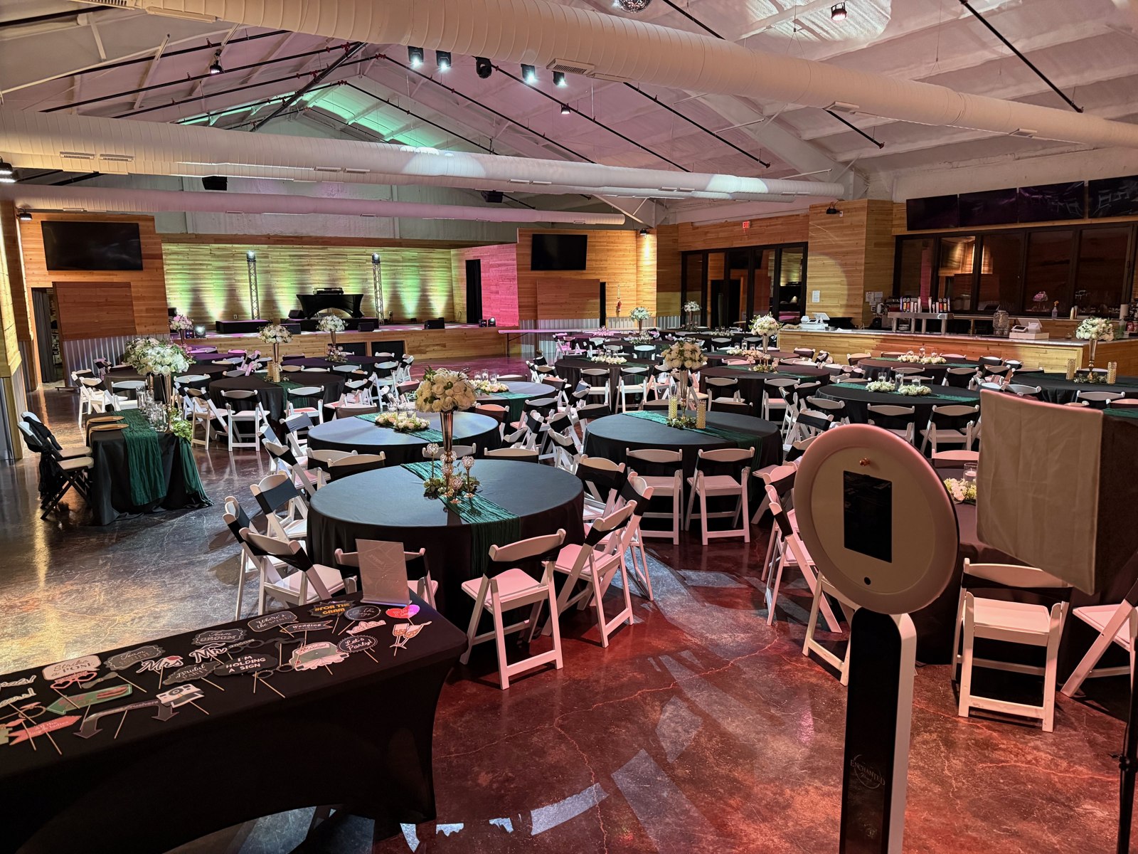 Reception tables with coordinated linens and floral centerpieces