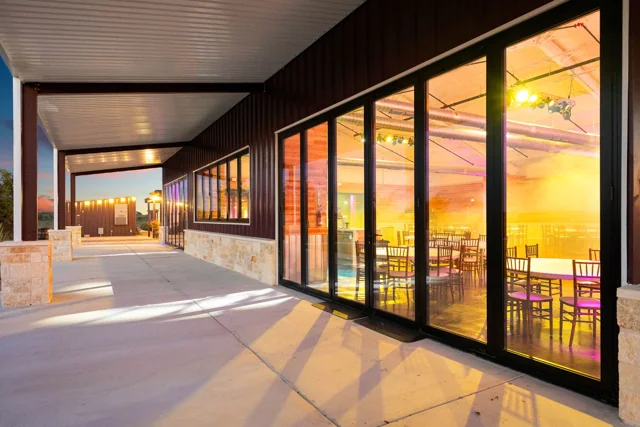 Golden light reflects in the event hall windows