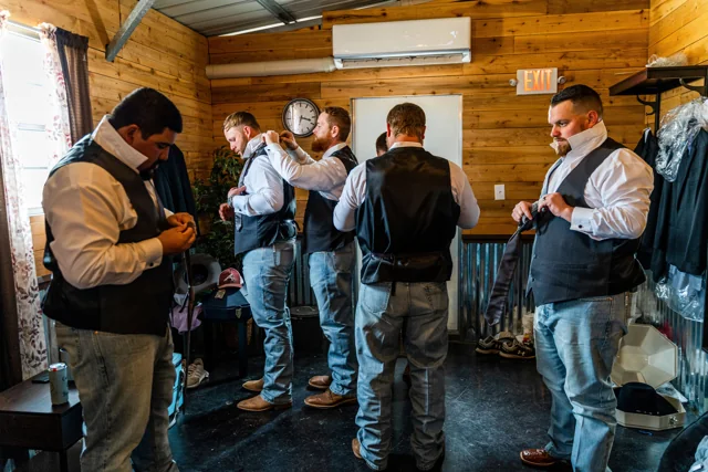 Friends gather at the ranch bar during a reception